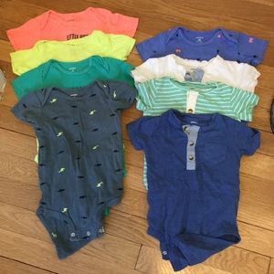 8 Carter’s Short-sleeved Onesies